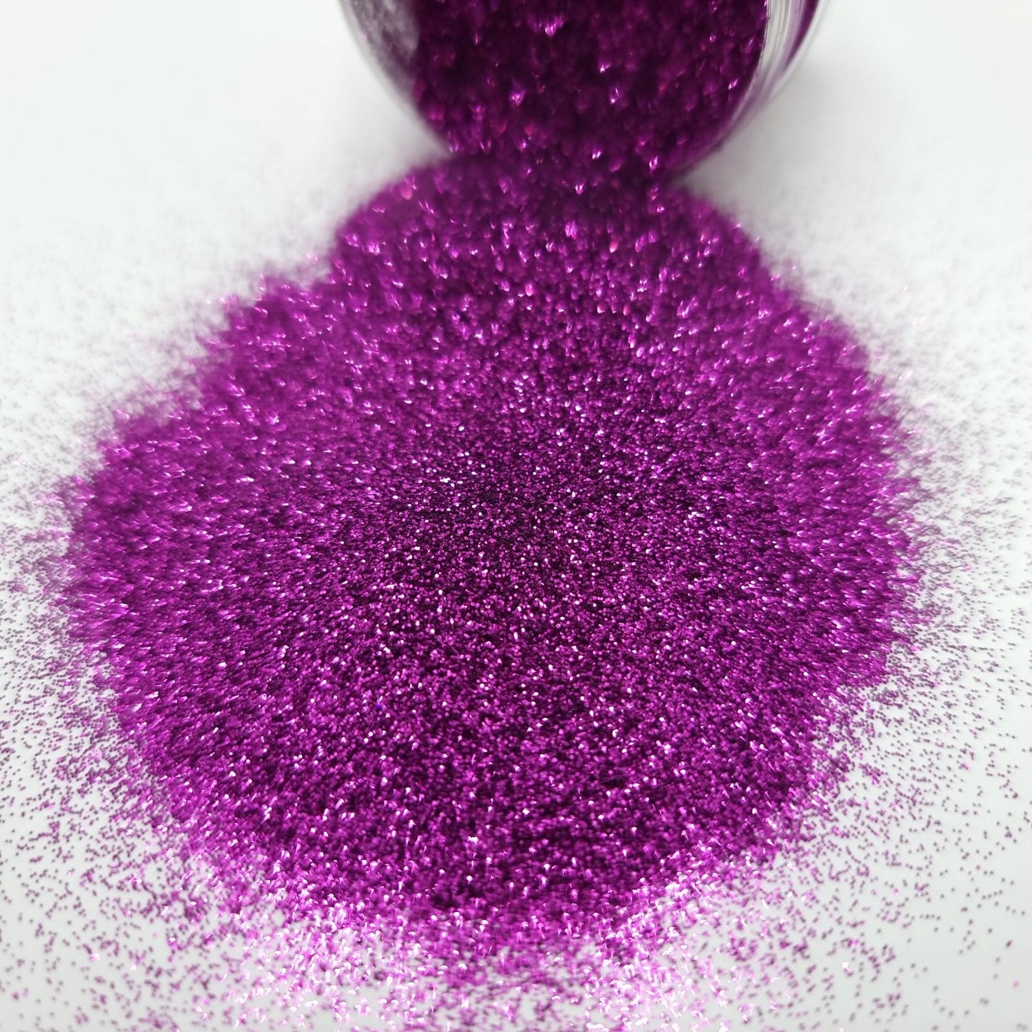 Here Kitty Kitty is a sparkly purple ultra fine glitter.