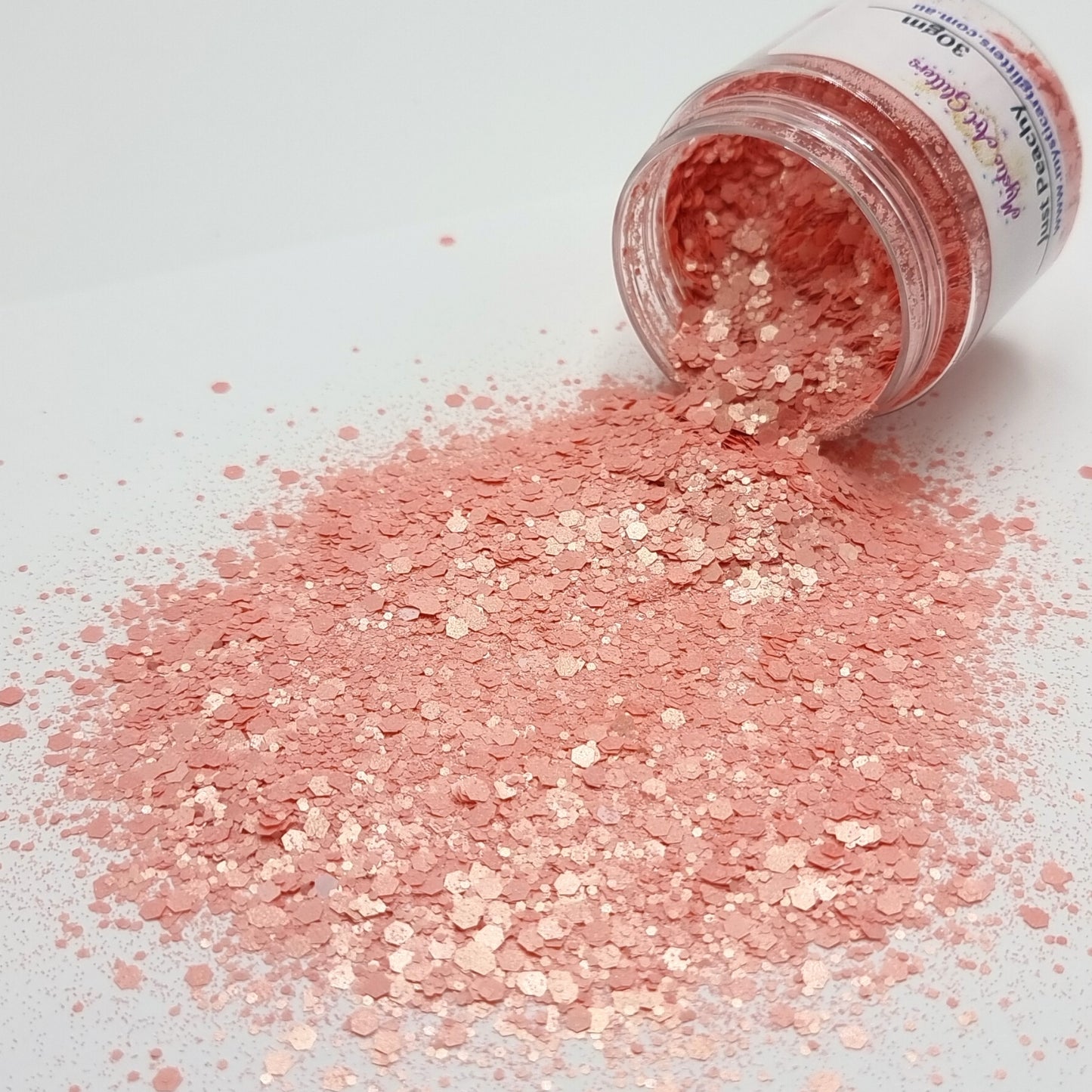 Just Peachy is a mixed size hex chunky glitter. 