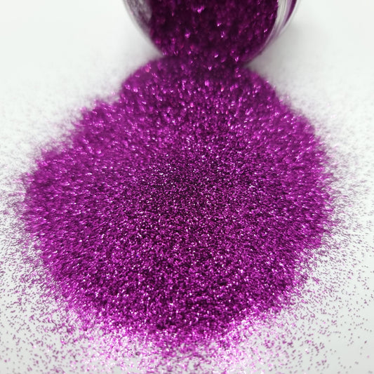 Here Kitty Kitty is a sparkly purple ultra fine glitter.
