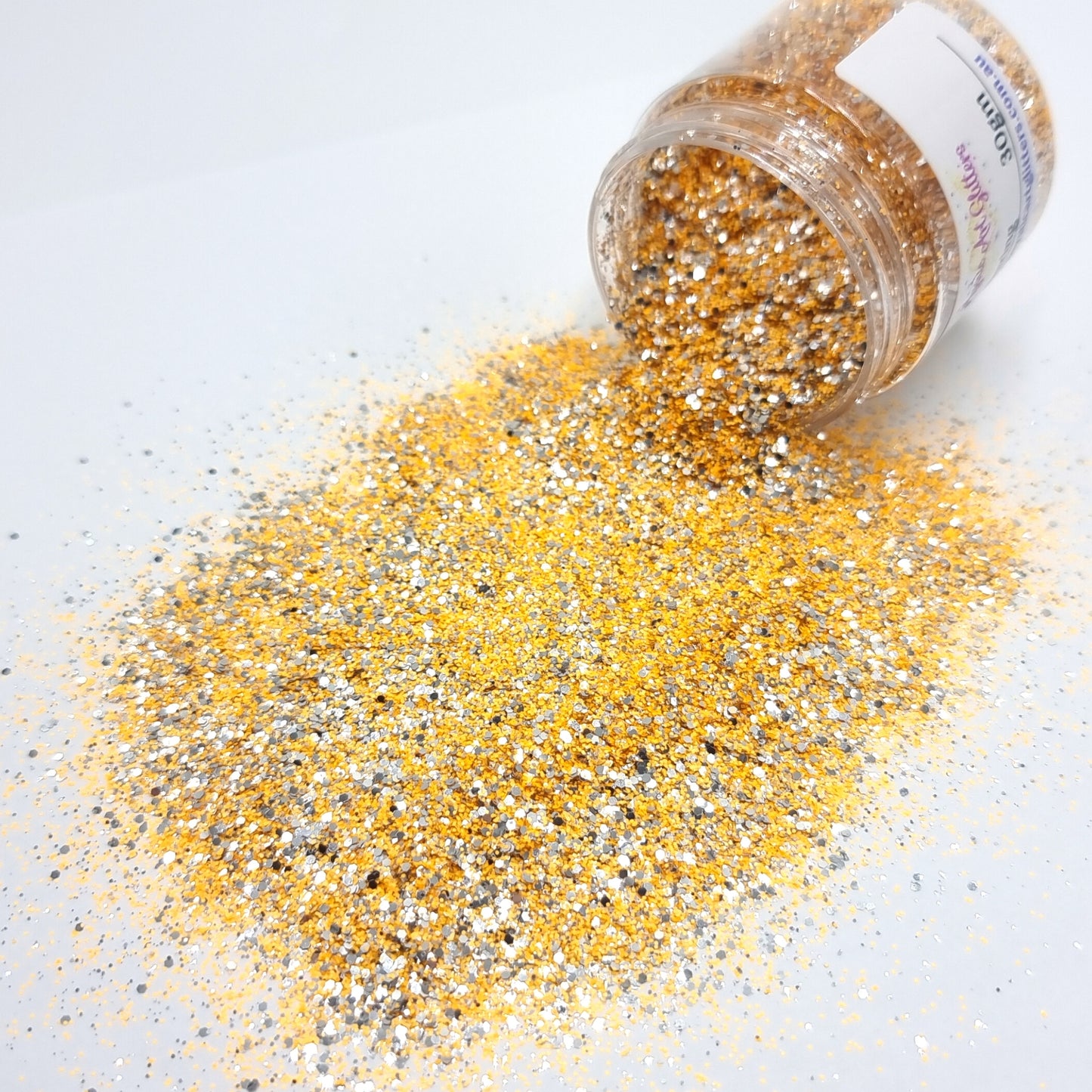 Alluring is an ultra fine orange and very fine silver glitter mix.