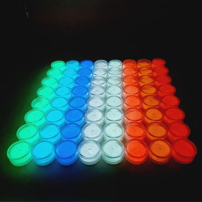 8 rows of different colours of glow in the dark mica powder