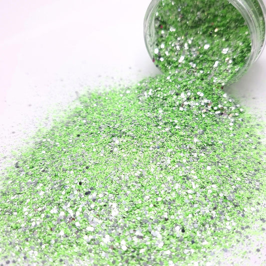 Tantalizing is a ultra fine green and very fine silver glitter mix.