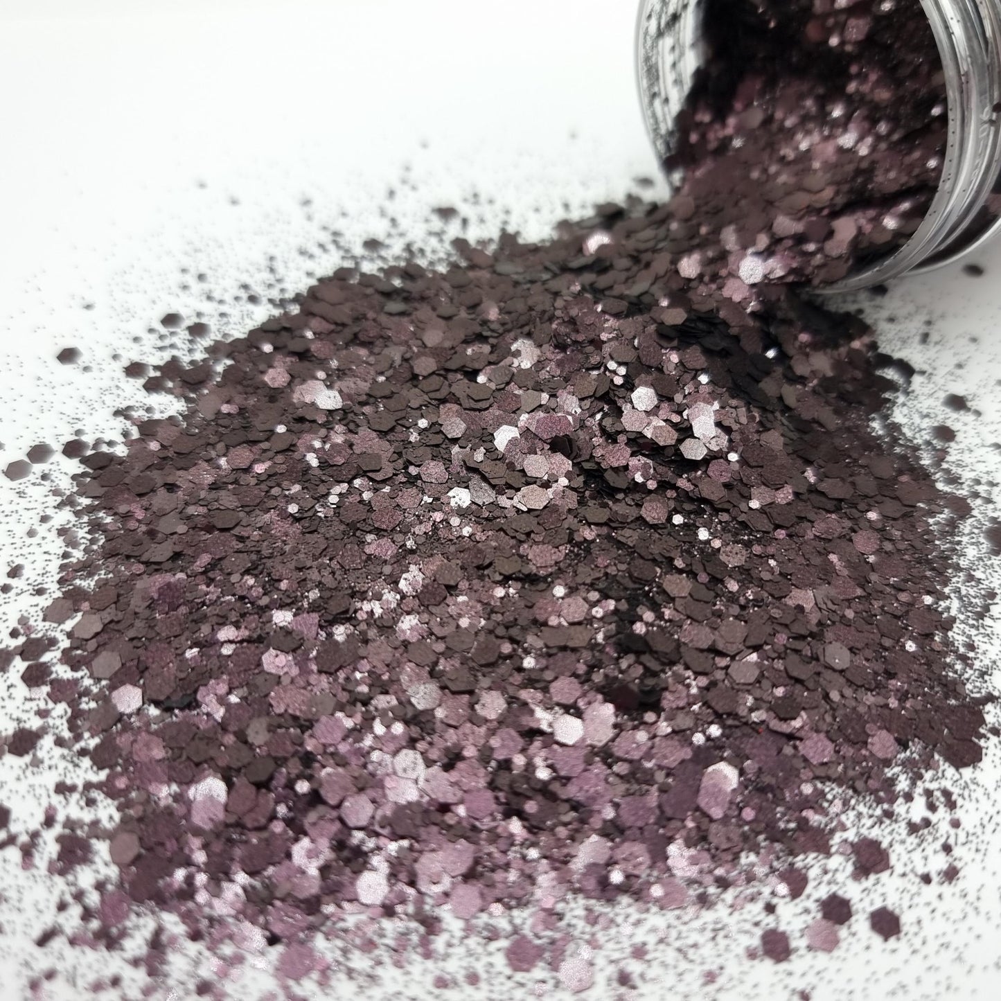 Witchcraft is a deep majestic purple metallic mixed size hex glitter