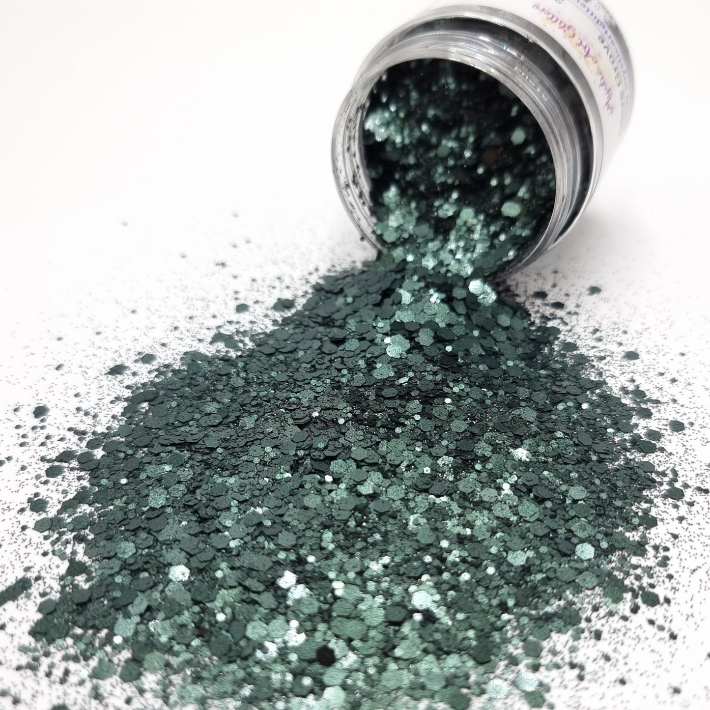 Olive Grove is a dark green, mixed size, metallic hex glitter.